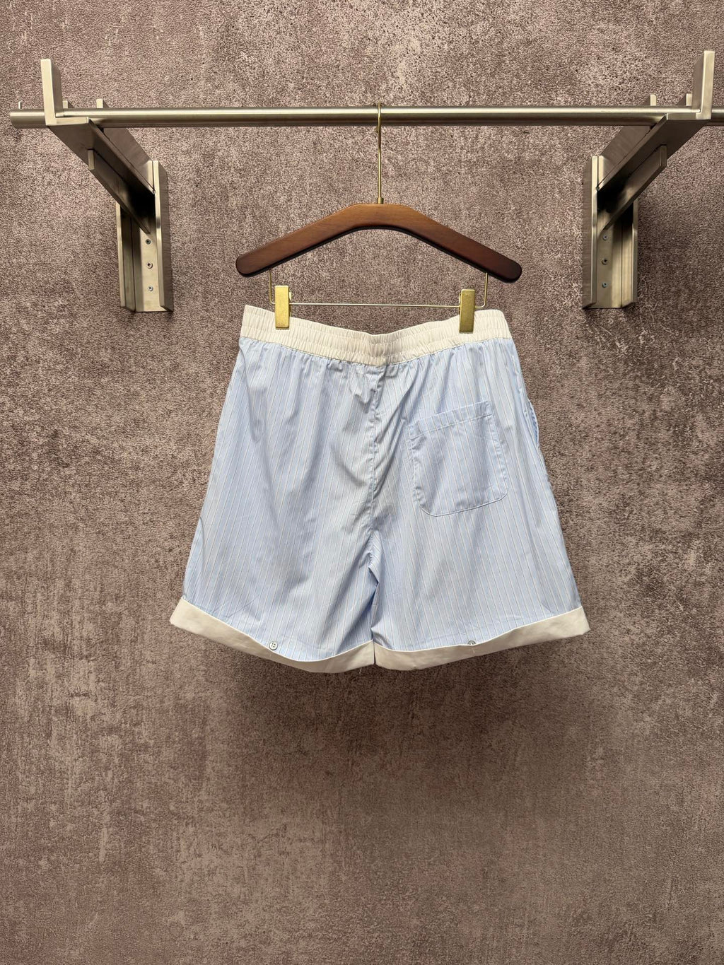 Light blue pinstripe shorts with elastic waist and cream trim, Louis Vuitton