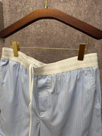 Light blue pinstripe shorts with elastic waistband and drawstring, Louis Vuitton