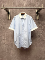 Light blue striped short-sleeve button shirt with cream pointed collar and cuffs