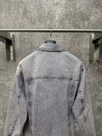 Light blue denim jacket back view with yoke seam and stitched collar