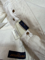 White shorts with Louis Vuitton label and size care tags
