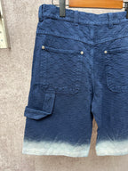 Gucci navy shorts with quilted texture and cargo pocket, light ombre hem