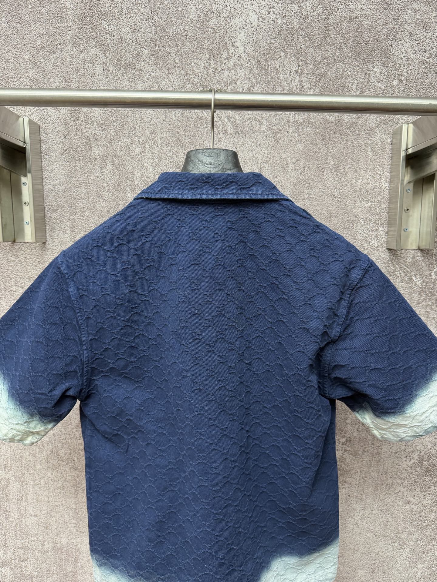 Gucci short-sleeve shirt back view, dark blue with light blue cuffs and hem