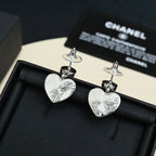 Heart drop earrings with round posts and sunburst textured heart pendants