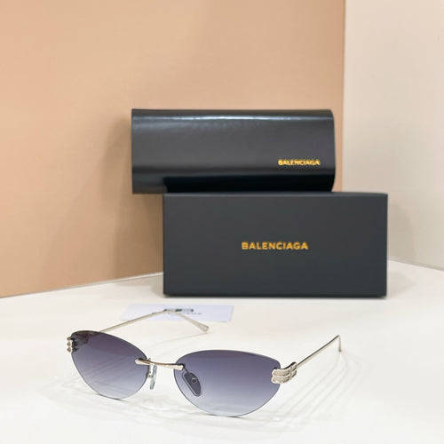 Sunglasses with dark tinted lenses and metallic gray frames