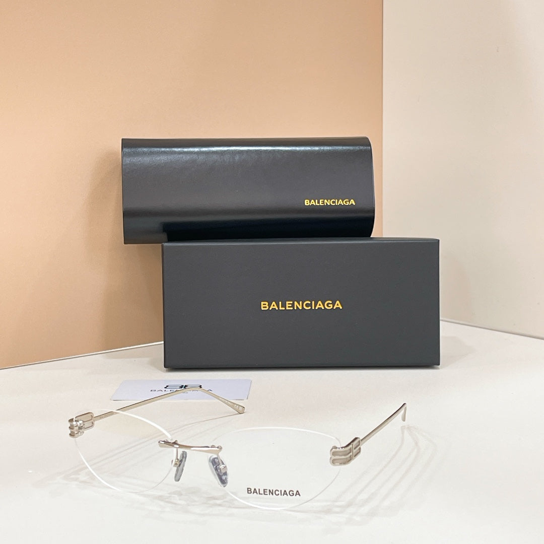 Sunglasses with clear lenses and silver-tone frames