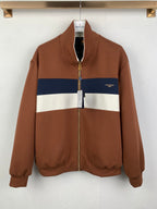Brown zip-up jacket with blue and white stripe panels, full front zipper