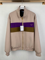 Beige zip-up jacket with purple and olive horizontal stripe, stand collar and pockets