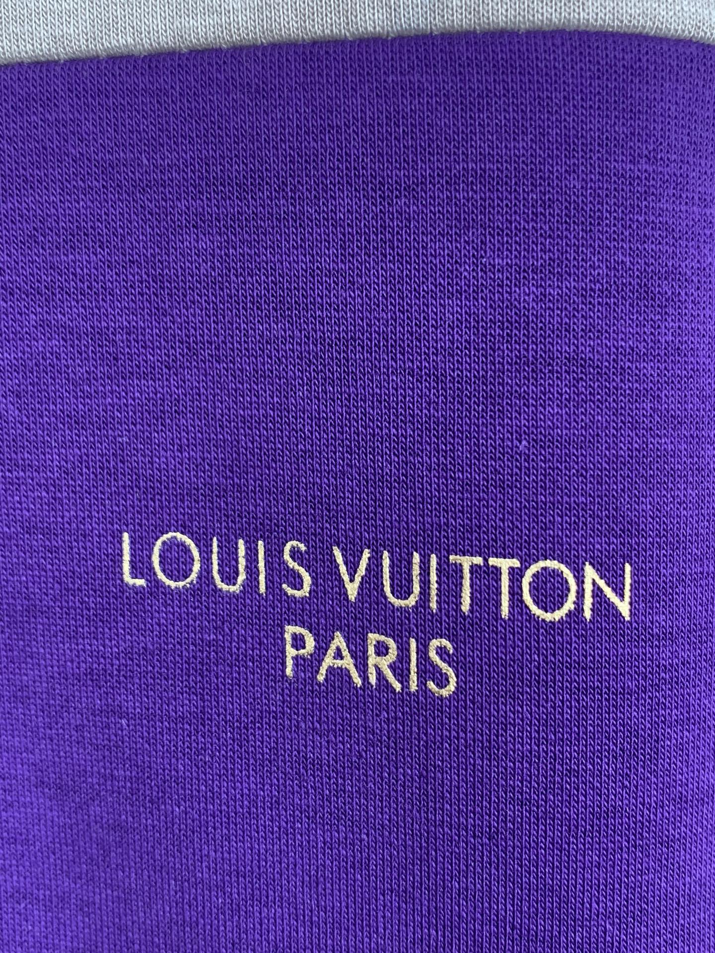 Purple knit fabric panel with “LOUIS VUITTON PARIS” logo text