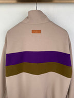 Beige jacket back with purple and olive stripe and small neck label