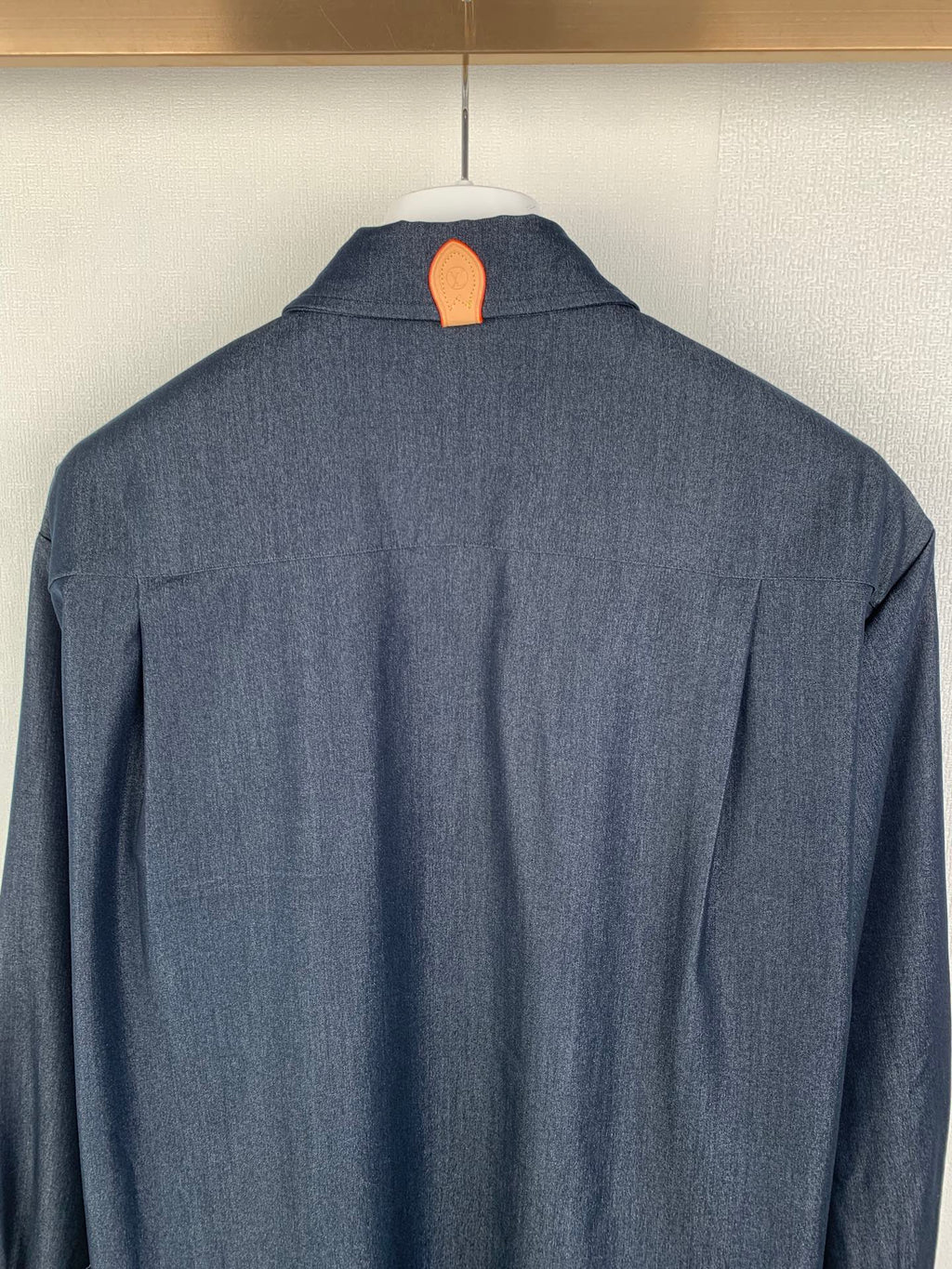Dark blue button-up shirt back yoke and shoulders