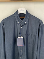 Dark blue button-up shirt with spread collar and chest pocket, front view