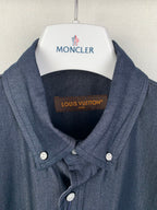 Dark blue shirt neckline and two-button collar, with inner label at chest