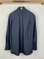 Dark blue long-sleeve button-up shirt, back view