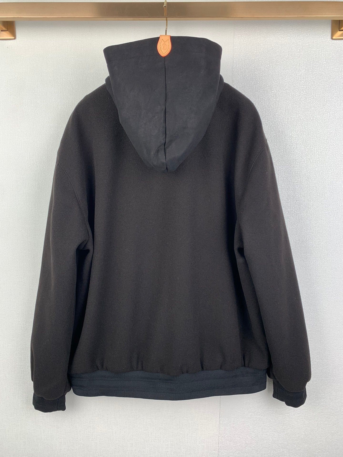 Louis Vuitton hooded zip-up jacket, dark gray, back view with hood