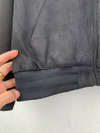 Louis Vuitton hooded zip-up jacket, dark gray, close-up of elastic hem band