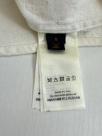 Louis Vuitton shorts, white fabric with care label tag at waistband