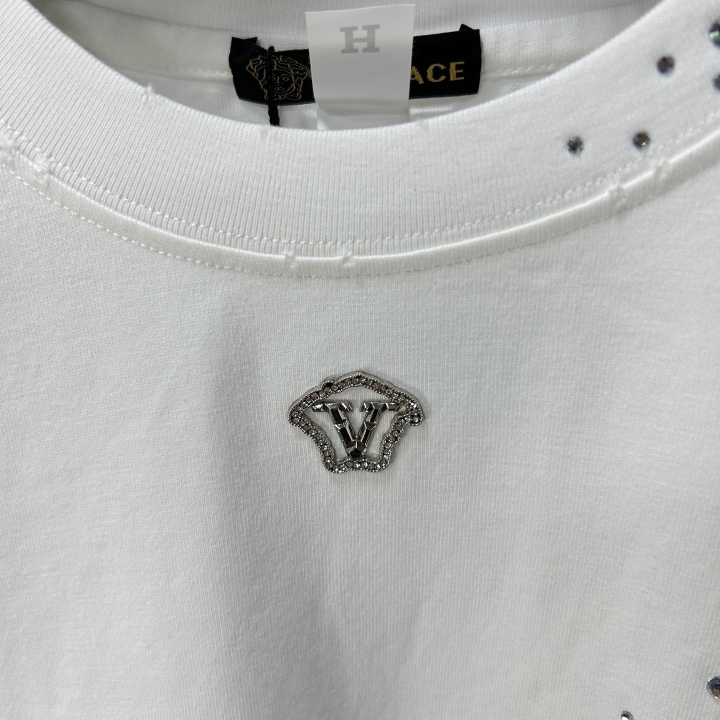 Versace white T-shirt crew neck with rhinestone logo centered on chest