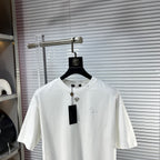 Versace white T-shirt with rhinestone logo at neckline and speckled stud detail
