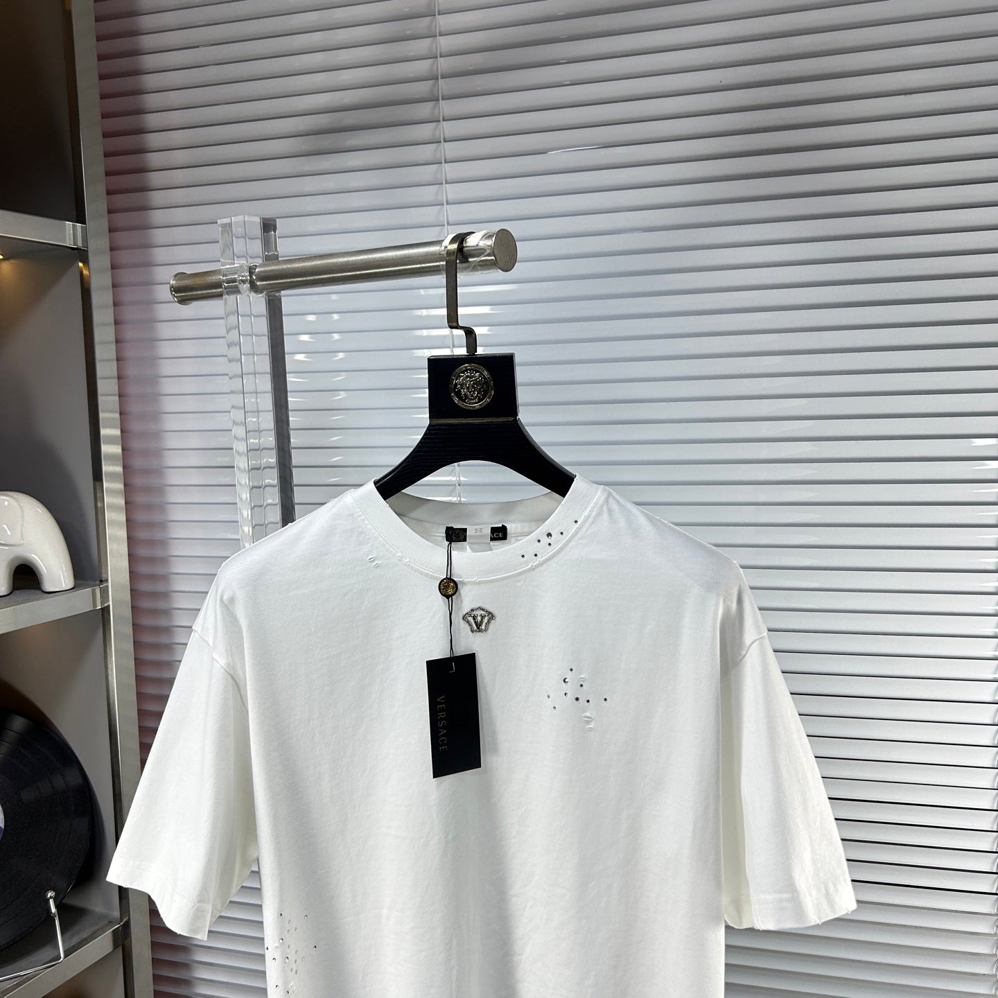 Versace white T-shirt with rhinestone logo at neckline and speckled stud detail