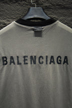 Balenciaga light gray T-shirt back collar and large BALENCIAGA print