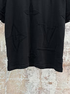 Louis Vuitton black short-sleeve shirt with embossed star and LV-style motifs