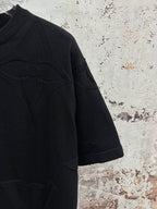 Louis Vuitton black short-sleeve shirt with side seam and embossed logo on chest