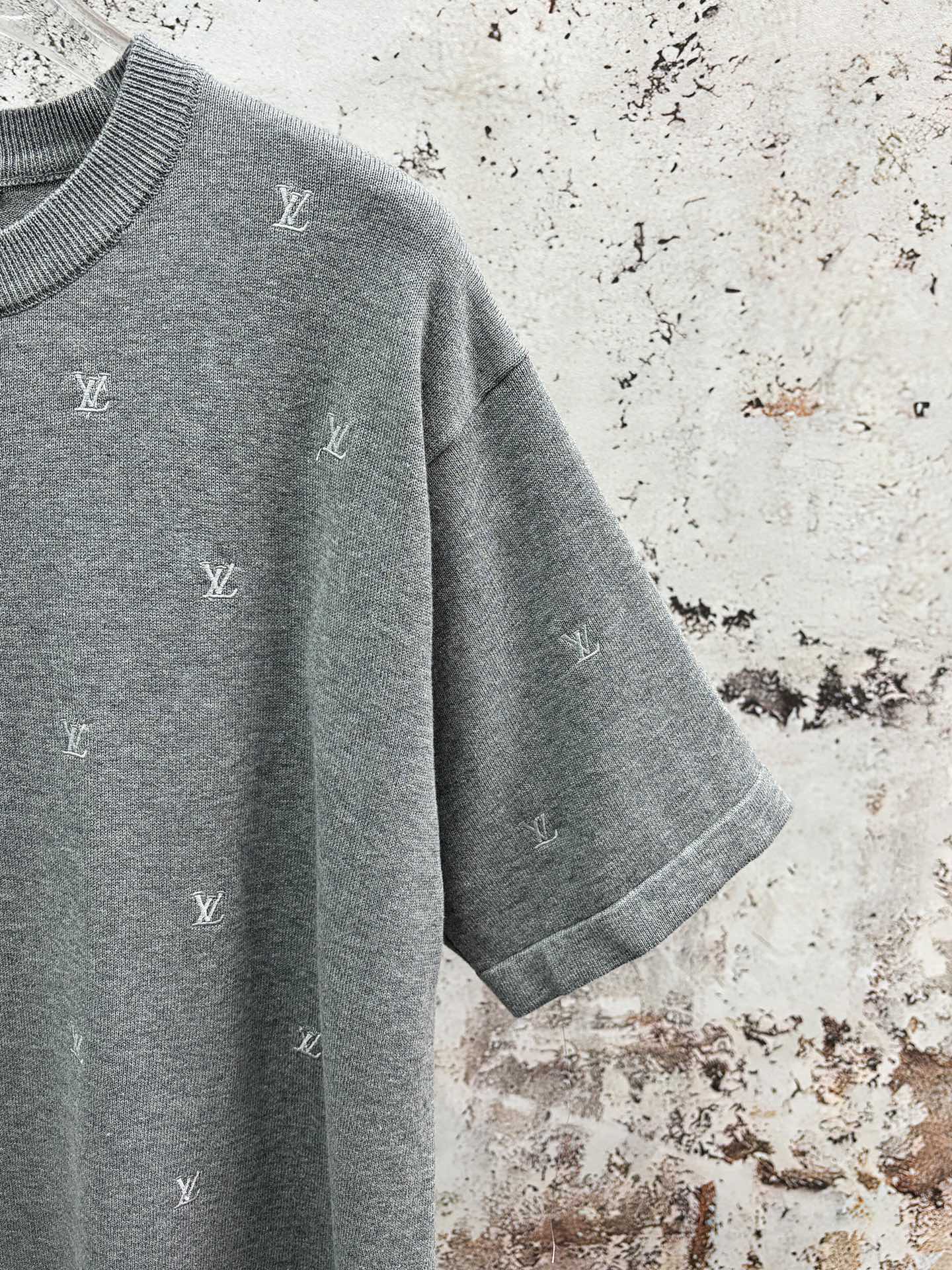 Grey monogram T-shirt sleeve and shoulder detail