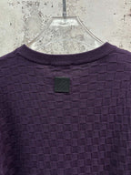 Purple textured knit T-shirt, back with small square patch near neckline