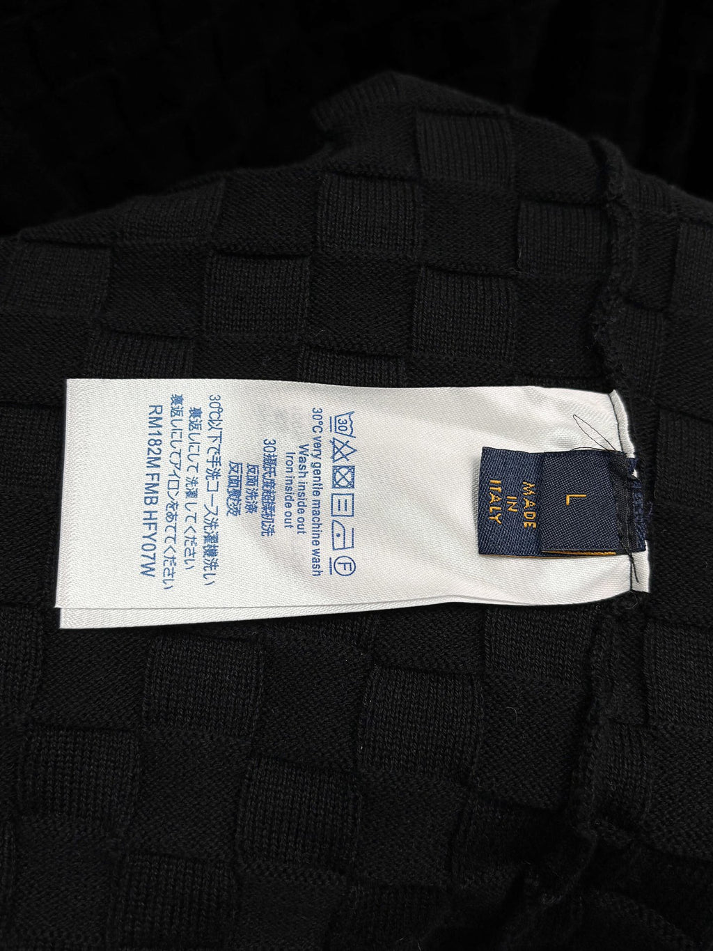 Louis Vuitton black textured knit T-shirt with size and care label inside