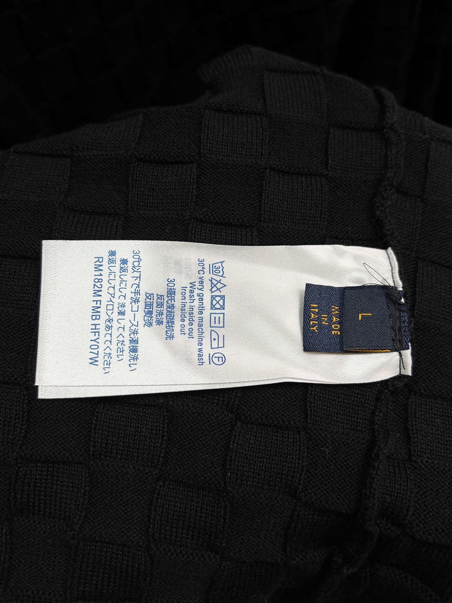 Louis Vuitton black textured knit T-shirt with size and care label inside