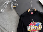 Black sweatshirt with ribbed crew neck and "KENZO PARIS" cartoon graphic