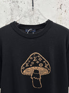 Black short-sleeve T-shirt with crew neck and gold Louis Vuitton-style emblem
