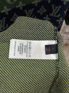 Inside neck label on short-sleeve knit shirt with care and size text tag