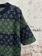 Crewneck short-sleeve shirt angled view with navy monogram print on sleeve