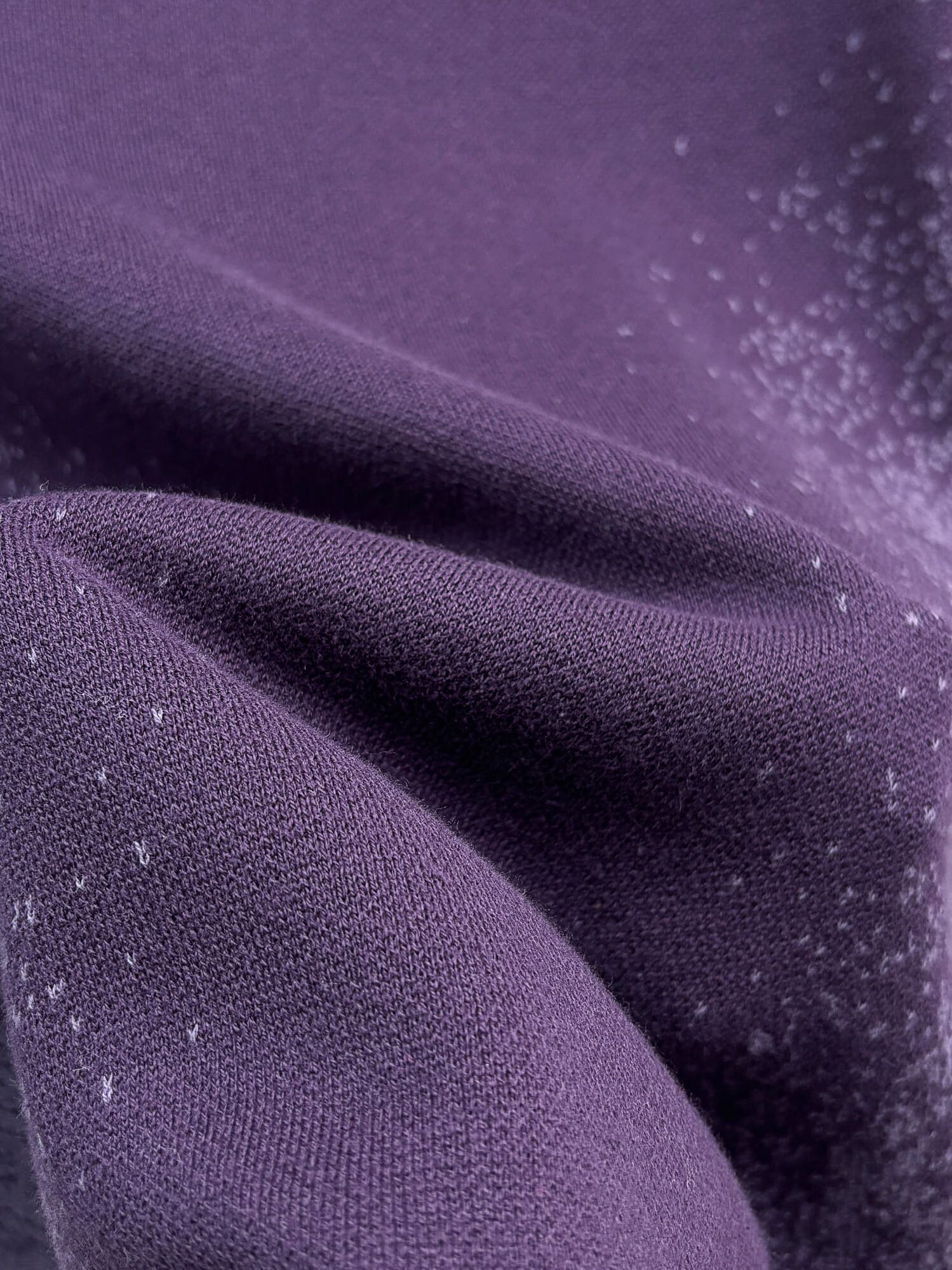 Purple speckled knit fabric detail on short-sleeve T-shirt