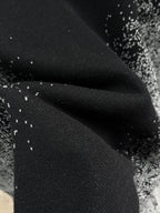 Louis Vuitton black knit fabric with fine white speckles and soft drape