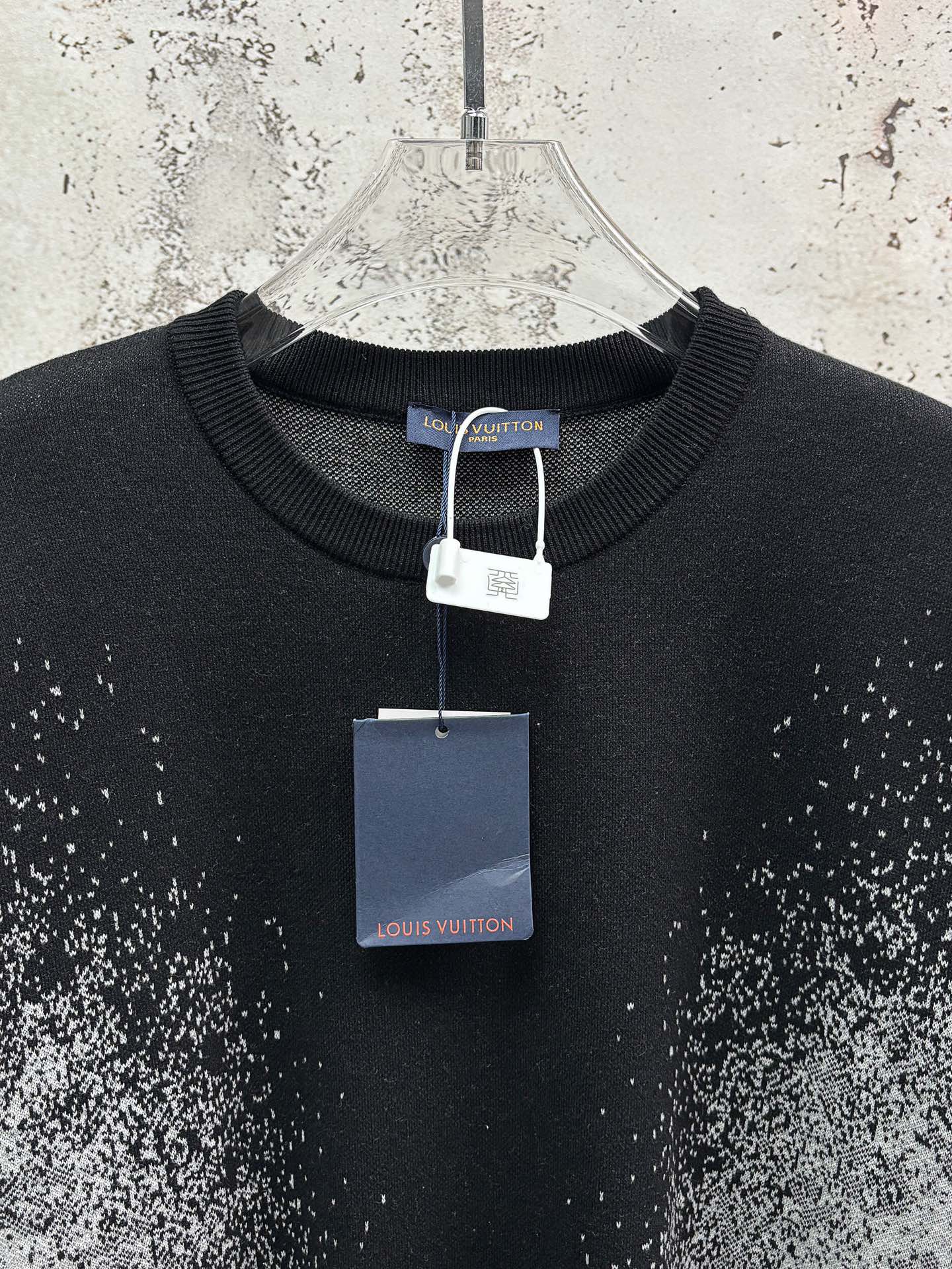 Louis Vuitton black T-shirt on hanger with ribbed collar and hanging tags
