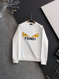 White long-sleeve sweatshirt with yellow logo graphic and FENDI wordmark