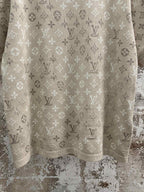 Beige monogram T-shirt with all-over logo pattern and hem band