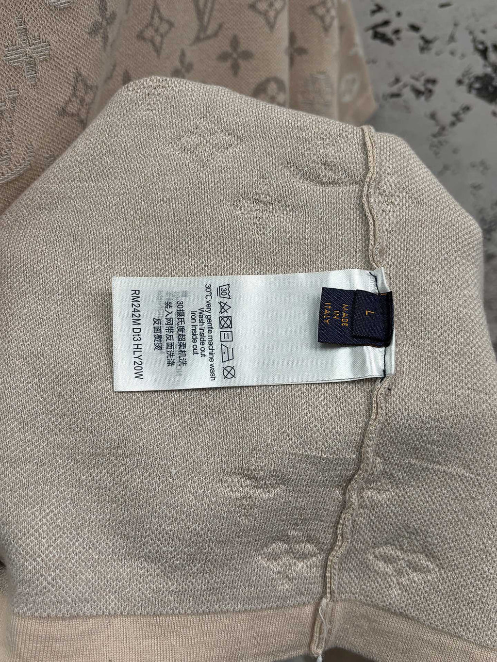 Beige monogram T-shirt with care label and brand size tag