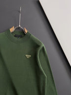 Green knit sweater with Prada triangular logo at the chest