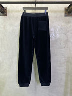 Dark navy pants with elastic waistband and front patch pocket