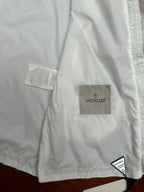 Moncler long white jacket with square Moncler logo patch