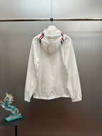 Moncler long white hooded jacket, rear view with red-and-blue sleeve stripe