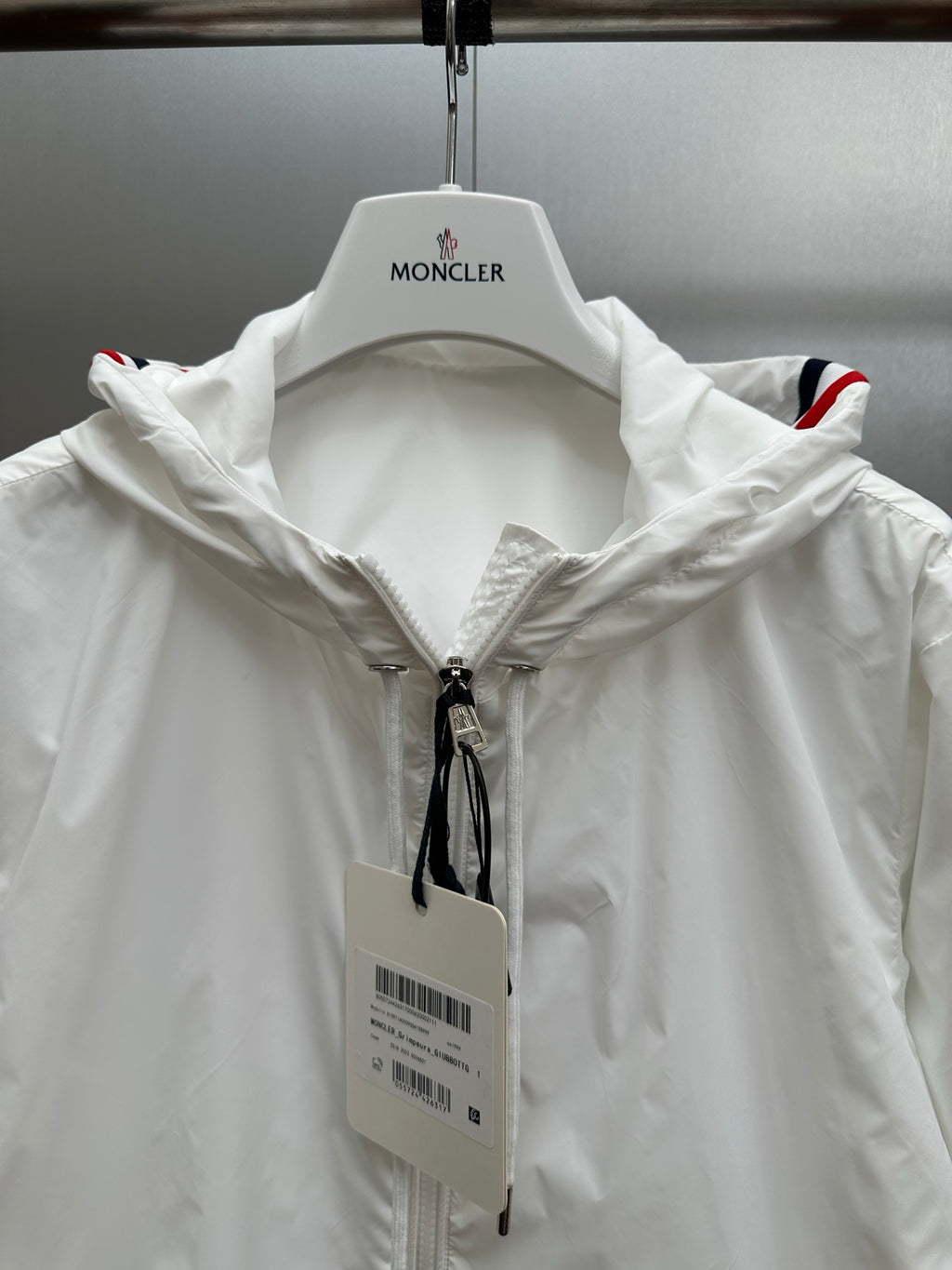 Moncler hooded long jacket with front zipper and drawstring collar