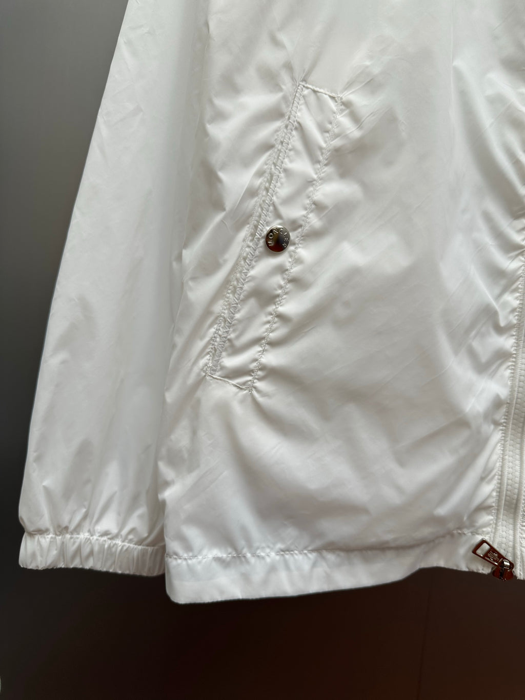 Moncler long white jacket with snap button and stitched seams