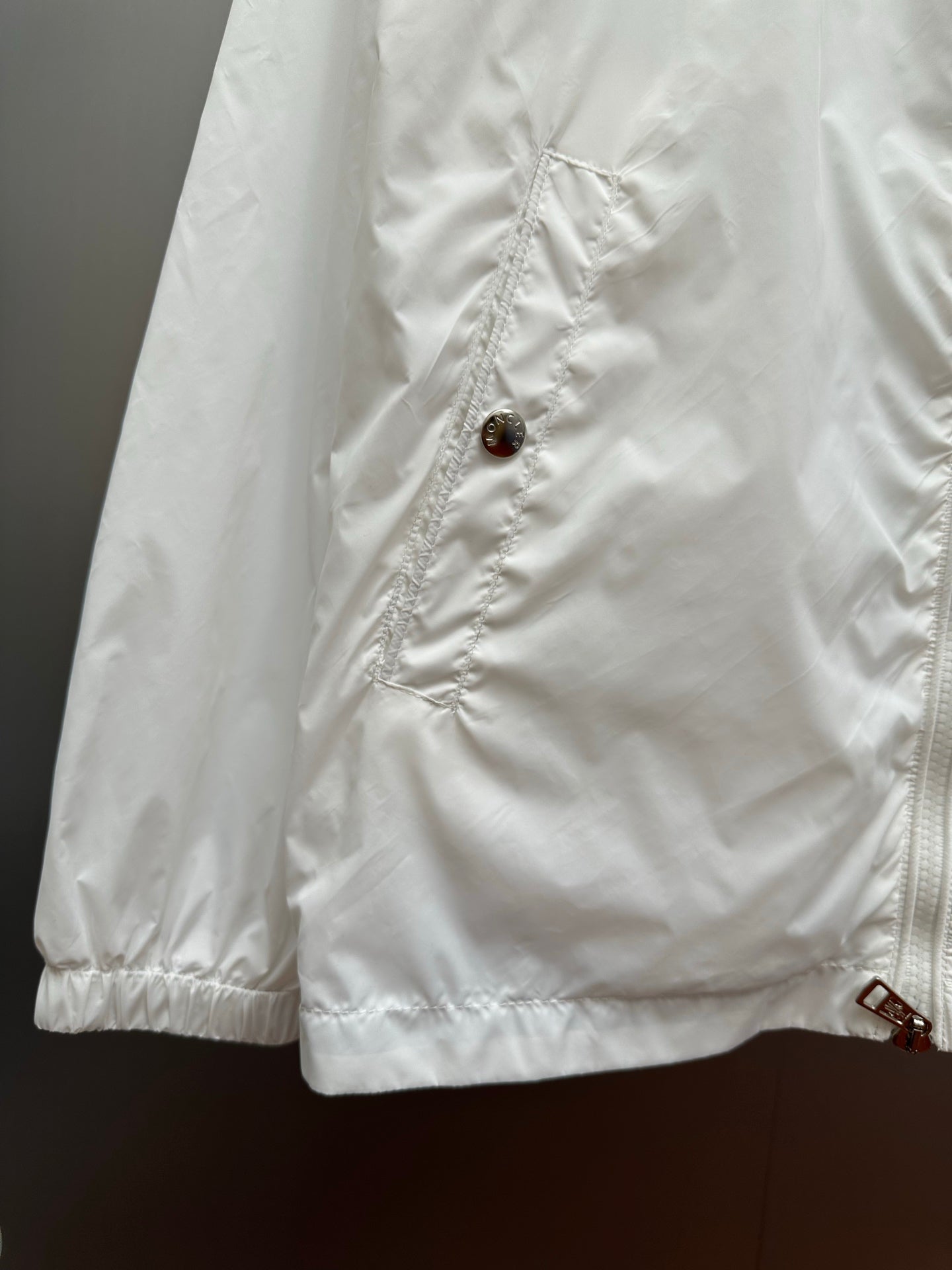 Moncler long white jacket with snap button and stitched seams