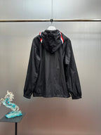 Moncler long hooded jacket, back view, black with red/blue stripe hood trim