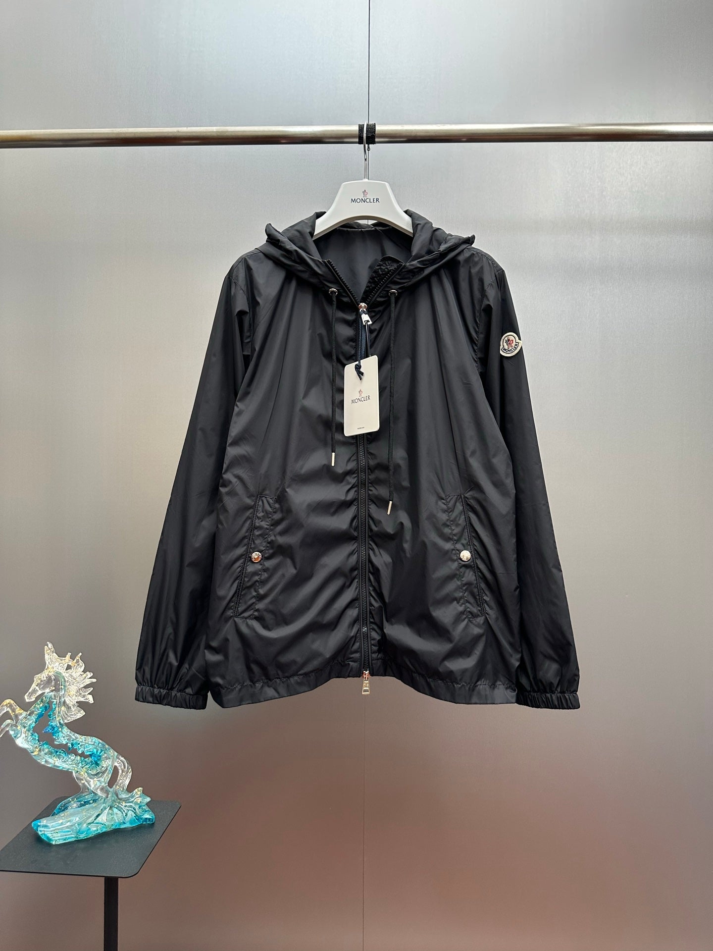 Moncler long black hooded jacket with front zipper and snap pockets